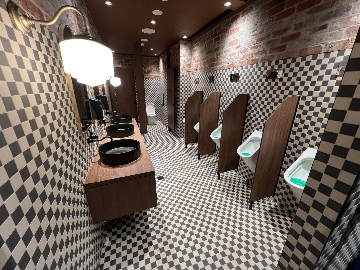 Commercial washroom with checkerboard walls